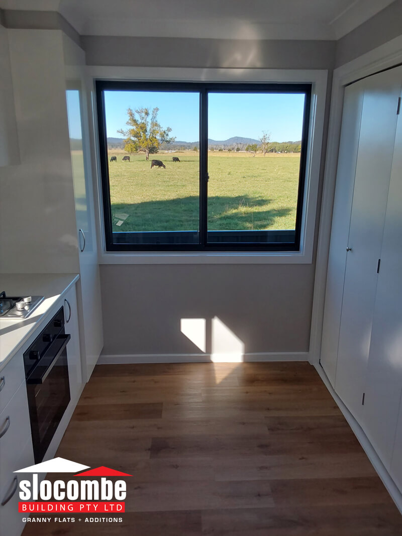 Princess Ave Wauchope - Kitchen view and laundry doors